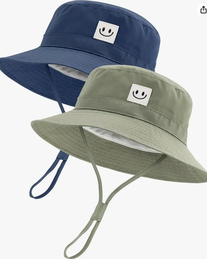 Navy and sage baby bucket hats with chin straps and smiley face patches