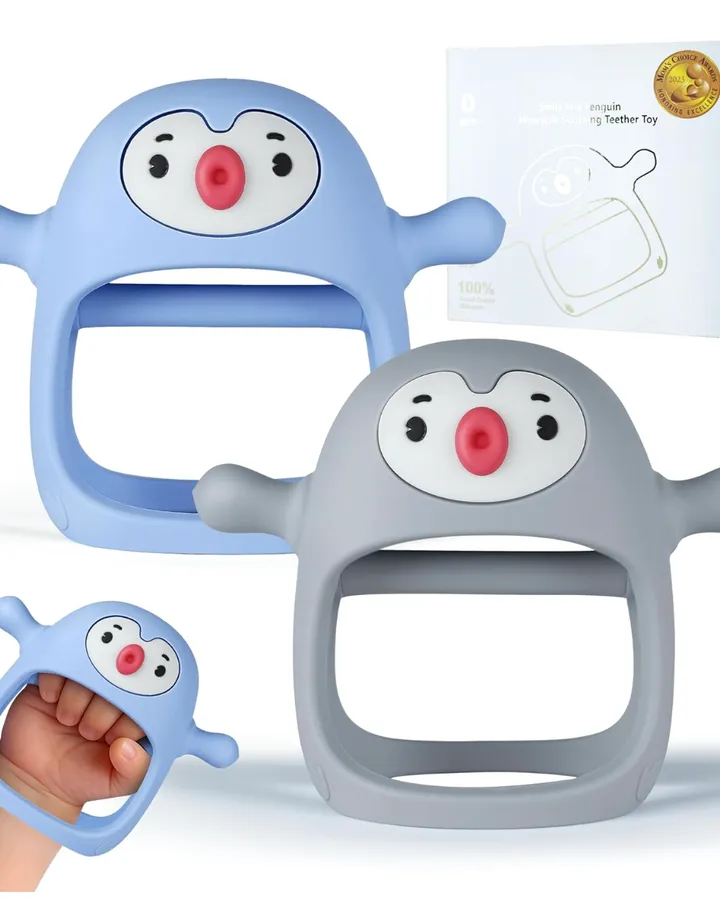 Blue and gray penguin-shaped silicone teething toys with packaging