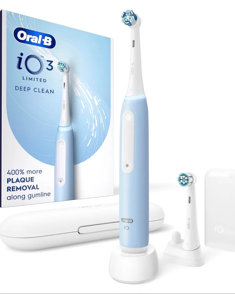 Oral-B iO rechargeable toothbrush set with box, charging base, brush head, and travel case