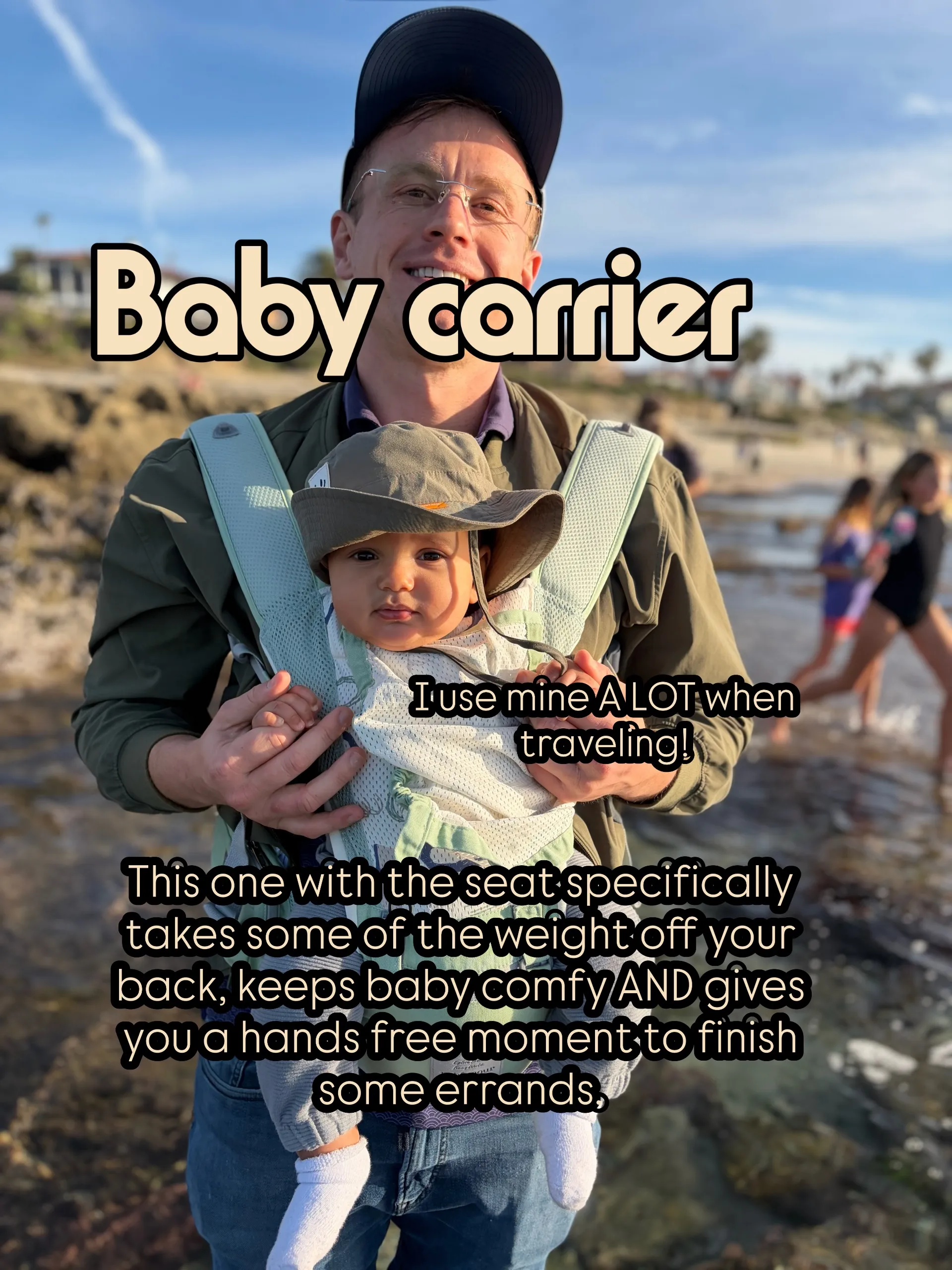 Theo carrying Noah in a Bebamour hip-seat carrier