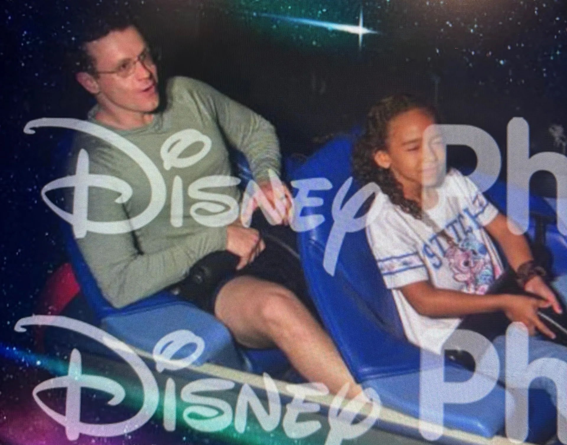 Theo and Niabelle riding TRON Lightcycle Run at Magic Kingdom